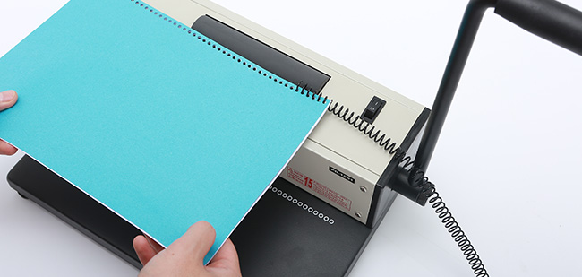 How to use a spiral binding machine for durable notebooks that fold back completely